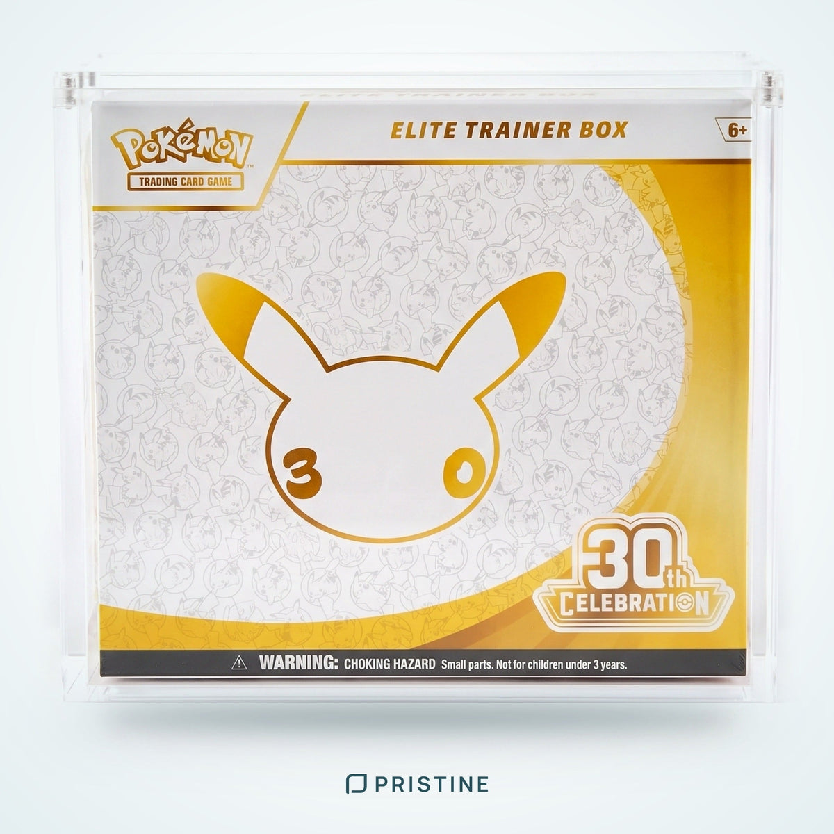 Elite Trainer Box de Pokémon expuesta en un protector de acrílico